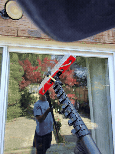 Waterfed pole window cleaning in action